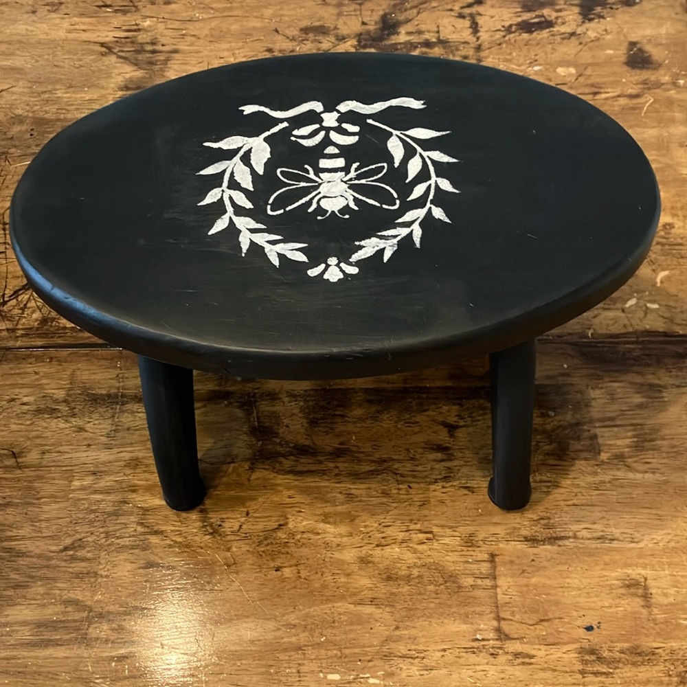 Black Oval Wooden Stool with Bee Design